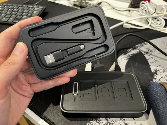 The lid lifted off the OmniCase 2, showing the various recesses for accessories and SD card storage.