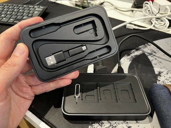 The lid lifted off the OmniCase 2, showing the various recesses for accessories and SD card storage.