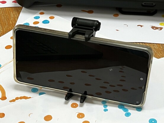 Front of a Pico X4 stood upright using the PowerA Moga XP-Ultra phone mount as a kickstand.