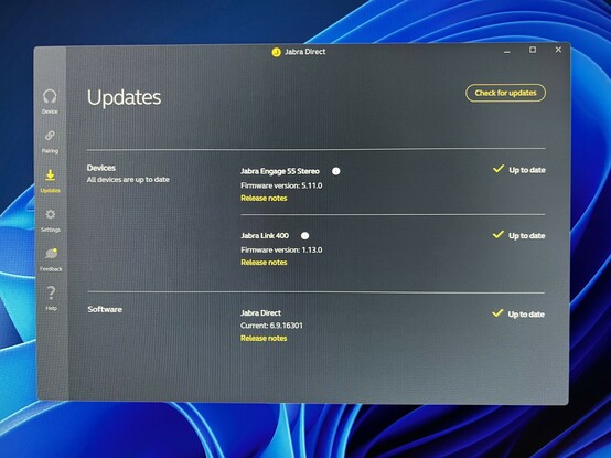 The updates page of the Jabra desktop software showing the connected devices, their current firmware version and links to release notes. Actual release notes!