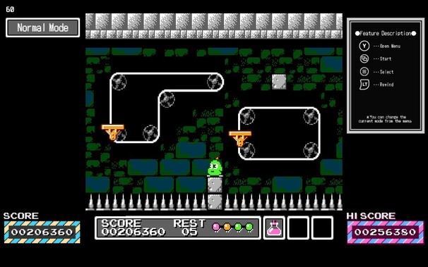 A later level. Spikes all over the ground, a great dank brickwork tile set in the background and some moving platforms on conveyor belts.