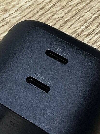 The USB C1 and C2 labels above their respective USB C ports. They’re harder to photograph than read somehow.