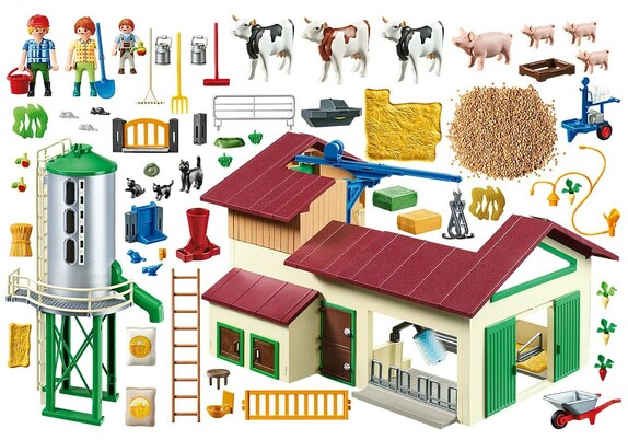 An image showing Playmobil's older farm set contents. The farm itself is larger than the newer set, there are many more smaller additions such as vegetables, plants, cow pats and more tools. There's even a pile of 
