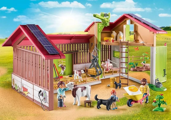 A product shot of the newer organic country farm. Detail has been added using stickers. The walls are now slatted wood, less plastic. The farm is smaller with fewer details. There are wooden fences and hay lining the floor. It looks distinctly small scale and one of the figures is petting a cow.
