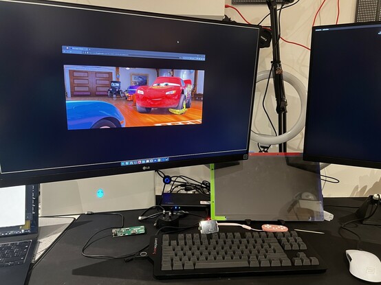 One of my monitors showing the Disney movie “Cars” playing in DisneyPlus on a DisplayLink connected display in a Firefox browser window. No problems with HDCP here.