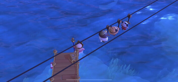 Me and my buds zooming down a zipline: it’s me, Chococat and Pochacco- though you can’t really make out the details. It’s a top down picture and the zipline cuts diagonally bottom left to too right across an ocean.