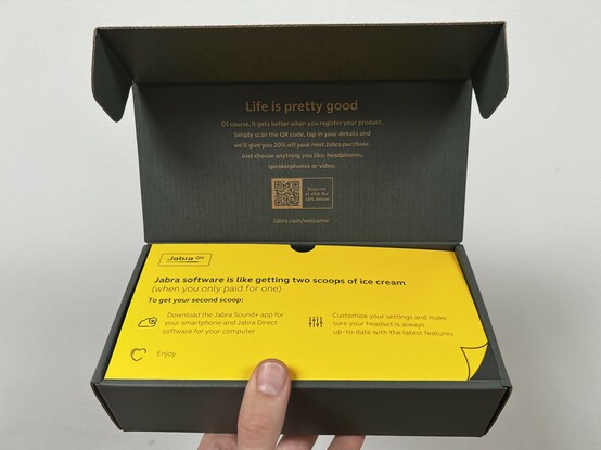 A shot of the box open. There’s a very high contrast yellow insert advertising their excellent software.