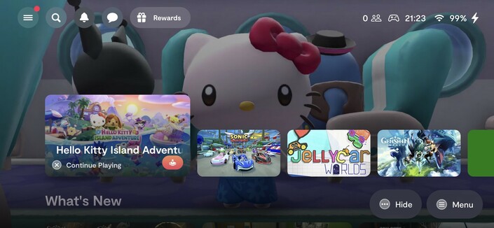 A screenshot of the backbone app Home Screen showing a row of four game tiles. Hello Kitty Island Adventure is selected so the background image shows Hello Kitty.