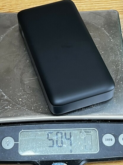 UGREEN’s battery on a kitchen scale. 504 grams.