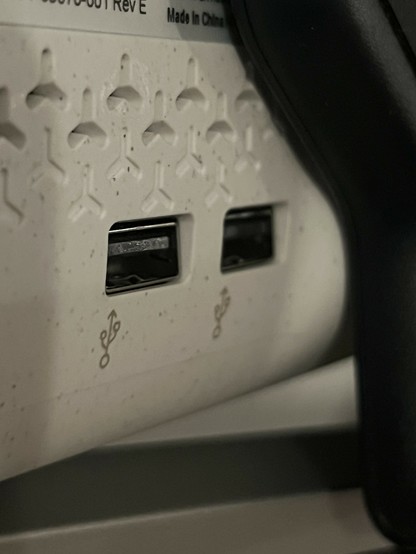 A closeup of the two USB A ports in the bottom of the Poly Studio P15.