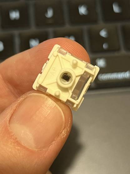 The backside of the Gateron KS-37B. There’s very obviously a tiny magnet inside the plunger.