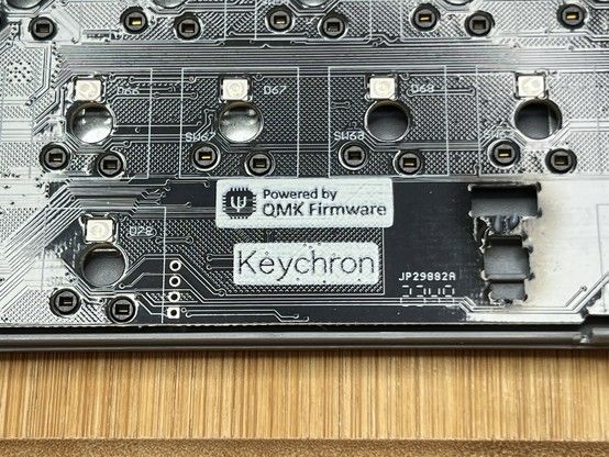 Close-up image of a Keychron keyboard circuit board, labeled with 
