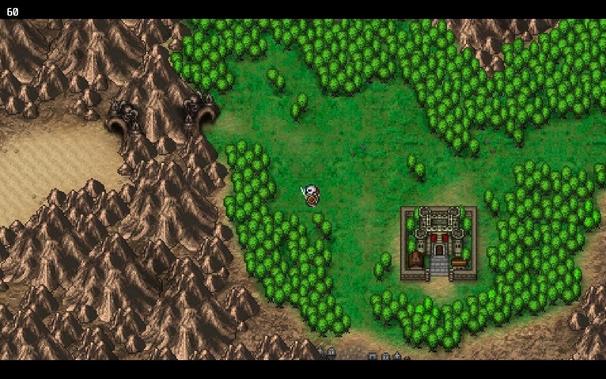 An old school 2D RPG overworld depicting deserts, mountains and green pastures with forests. A fortress of some kind sits in the bottom right.