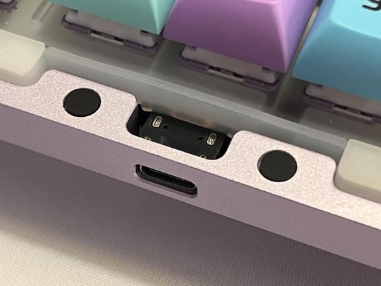 A closeup of the back edge of the keyboard where the PCB extends slightly to escape the USB Type C port.