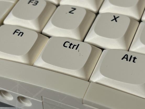 A closeup of the Ctrl key on the left-hand side, showing some black marks marring the white surface.