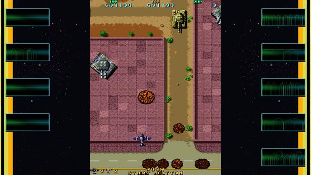 A vertical scrolling shooter in the middle of a screen, flanked by nine little boxes showing various audio waveforms for the different audio channels.