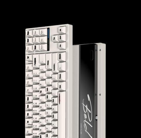 A fairly utilitarian blocky white keyboard with keycaps that are either GMK CYL redacted or a knock off. Looks alright.