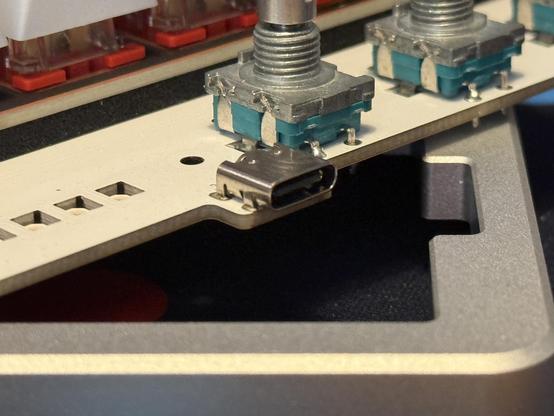 A closeup of the PCB edge showing a USB Type-C port on a small protruding nub.