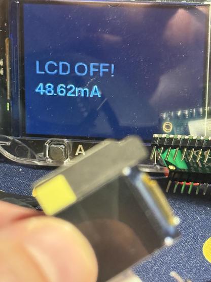 A blurry photo showing another power measurement, this time with the LCD off and reading 48.62mA. That’s a lotta beans for just an MCU doing not much.