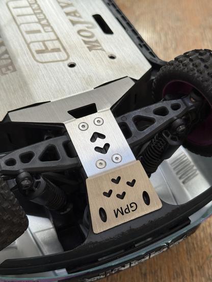 The full skid plate installed on the RC car. Shiny and new.