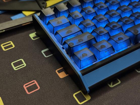 The black/blue parts fitted to the keyboard giving a clean finish and matching the blue backlight.