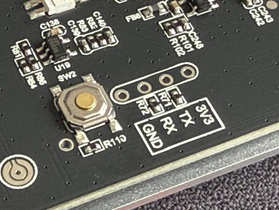 A closeup of an unpopulated .1” pitch UART header. I wonder if it squawks.