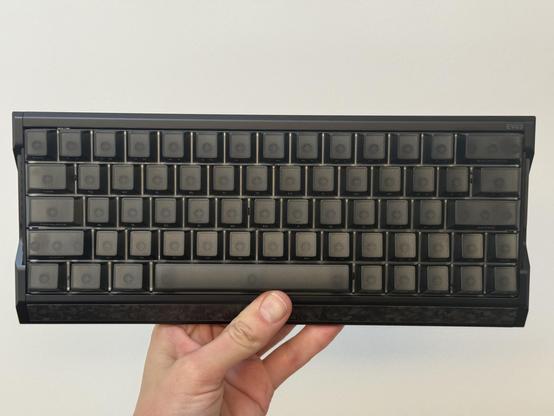 The IQUNIX EV63 HE in all its glory. A 63% compact hall-effect keyboard with black semi translucent keycaps.