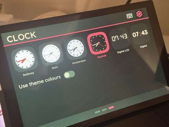A palette of clock faces to choose from, rendered in their default colours. Each face is rendered as it appears on device and even updates in real-time.