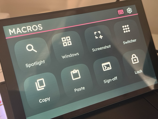 A 4x2 palette of buttons mapped to common macOS actions including spotlight, Mission Control, screenshots and more.